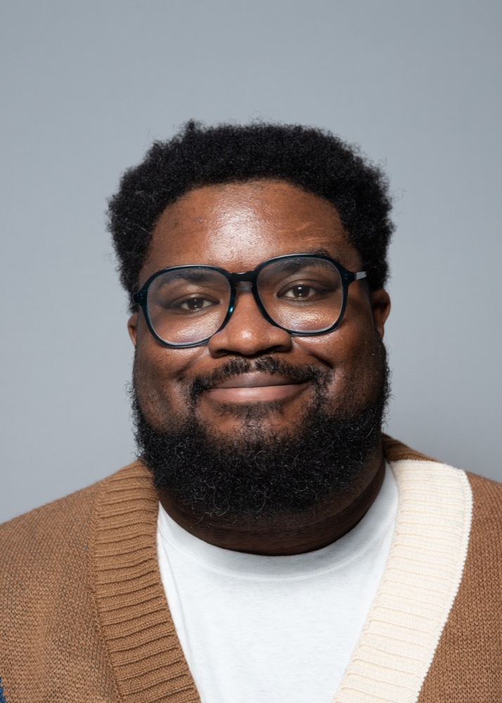 Portrait of writer-director Adam Thomas.