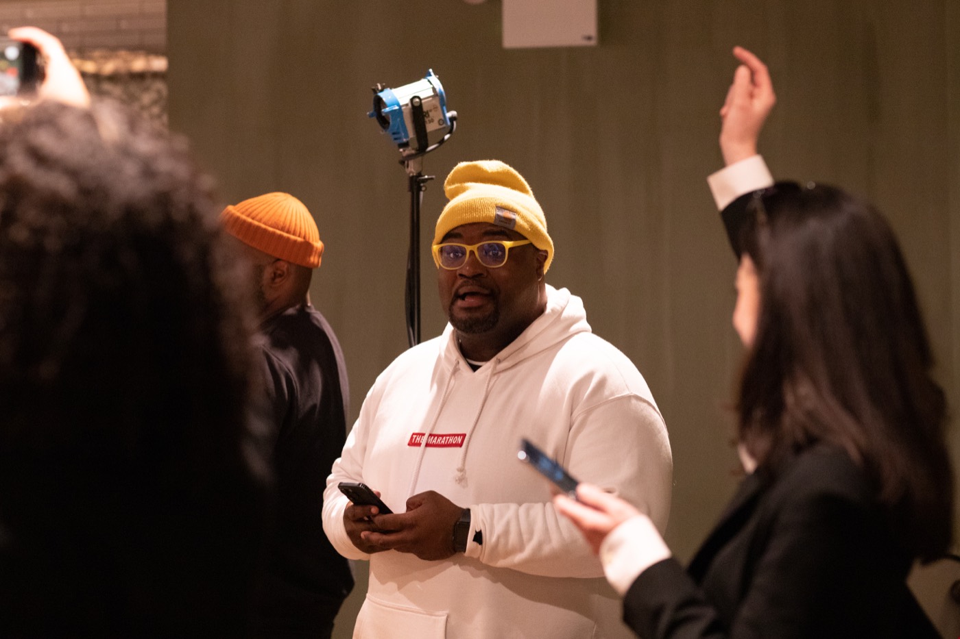 Behind-the-scenes image from Everything Is Fake showing direction on set.